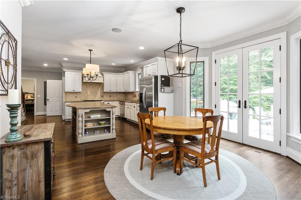 8302 Linville Oaks Drive Oak Ridge, NC 27310 - Photo 16 of 46 Not pictured to the left is a large walk-in pantry with wood shelving.