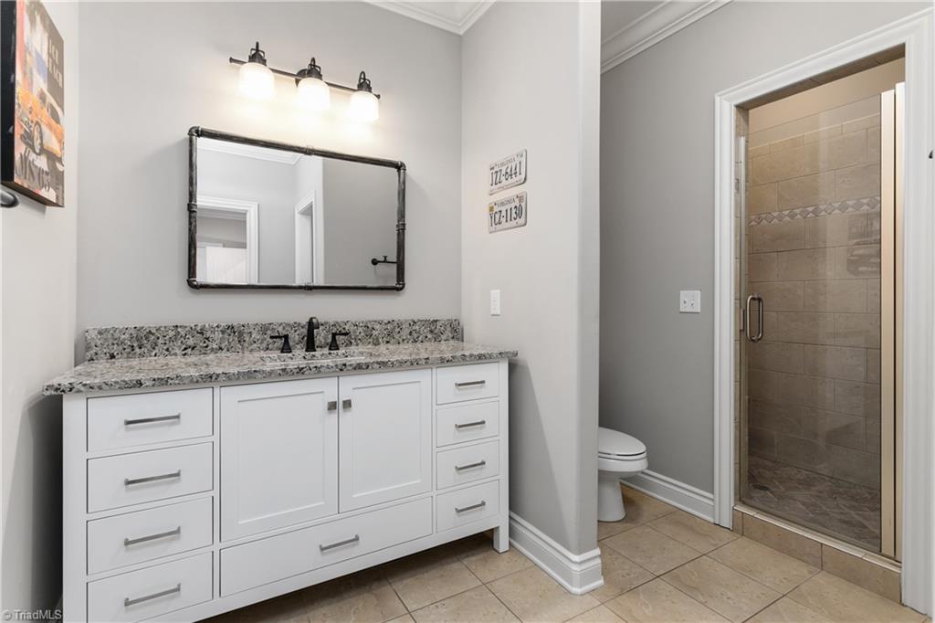 8302 Linville Oaks Drive Oak Ridge, NC 27310 - Photo 29 of 46 Spacious and updated all bath upstairs.