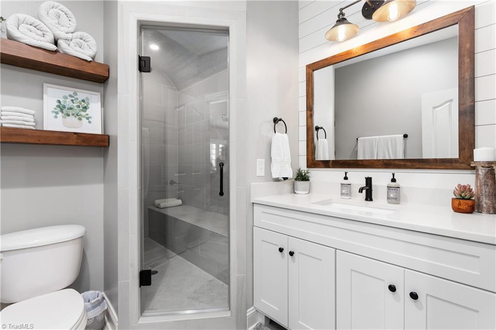 8302 Linville Oaks Drive Oak Ridge, NC 27310 - Photo 37 of 46 Full bath with a great steam shower.