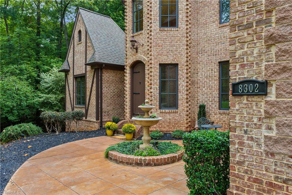 8302 Linville Oaks Drive Oak Ridge, NC 27310 - Photo 46 of 46 Front entry courtyard
