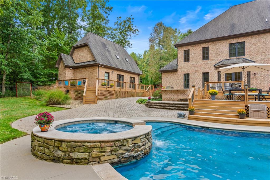 8302 Linville Oaks Drive Oak Ridge, NC 27310 - Photo 8 of 46 Amazing back yard entertaining area!