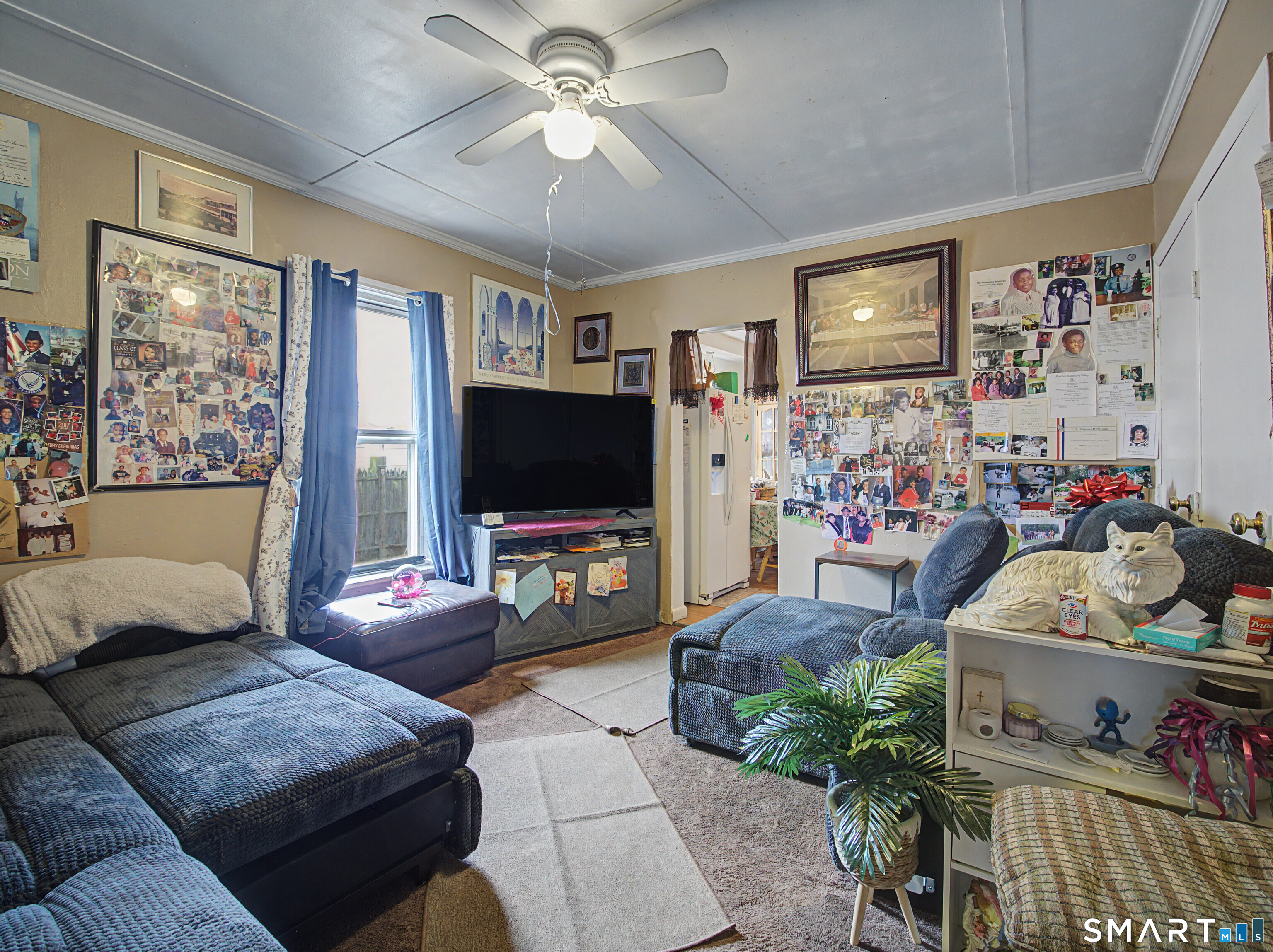 68 Rowan Street Danbury, CT 06810 - Photo 17 of 34 a living room with furniture and a flat screen tv