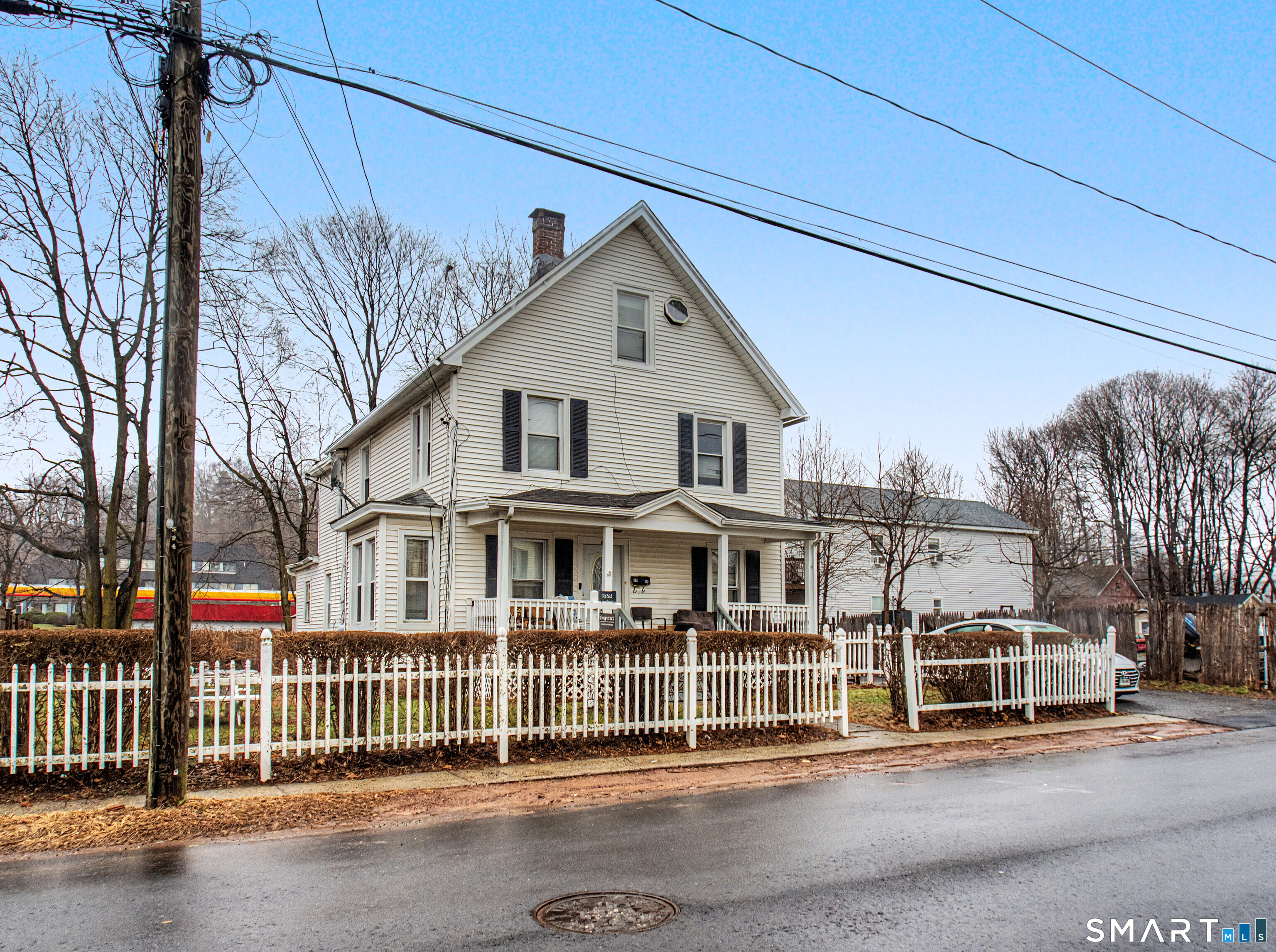 68 Rowan Street Danbury, CT 06810 - Photo 2 of 34 a front view of a large white house