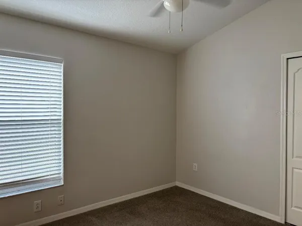 en empty room with a window