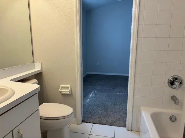 a bathroom with a sink and a toilet