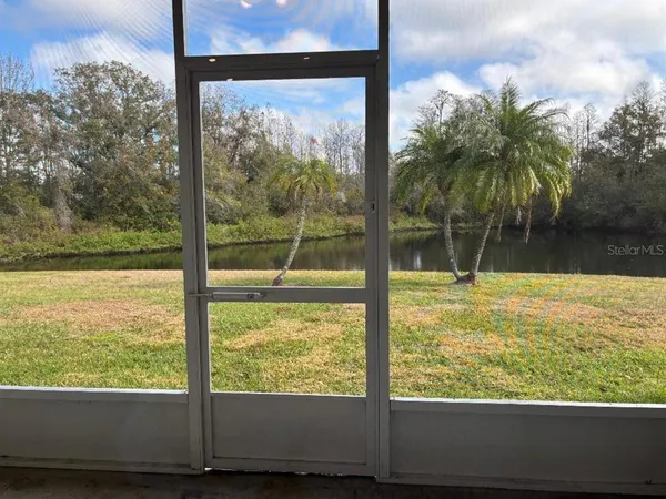 a lake view with a fountain