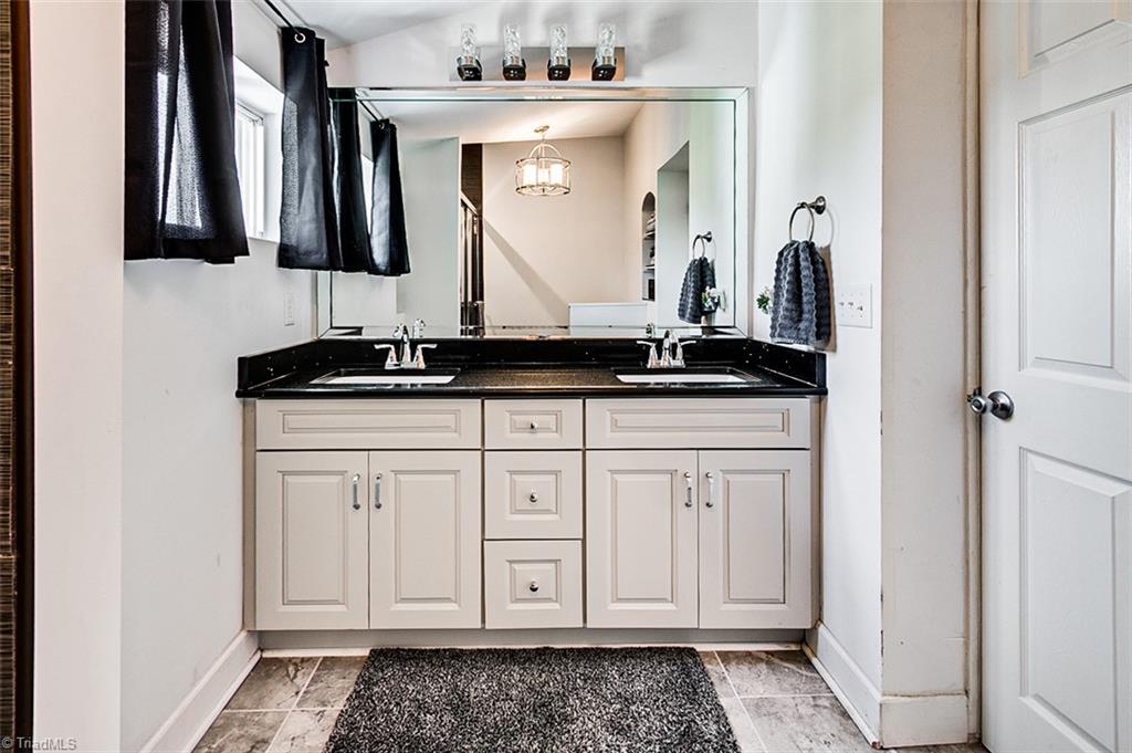 7008 Turnpike Road Archdale, NC 27263 - Photo 17 of 39 Double vanity in primary bathroom