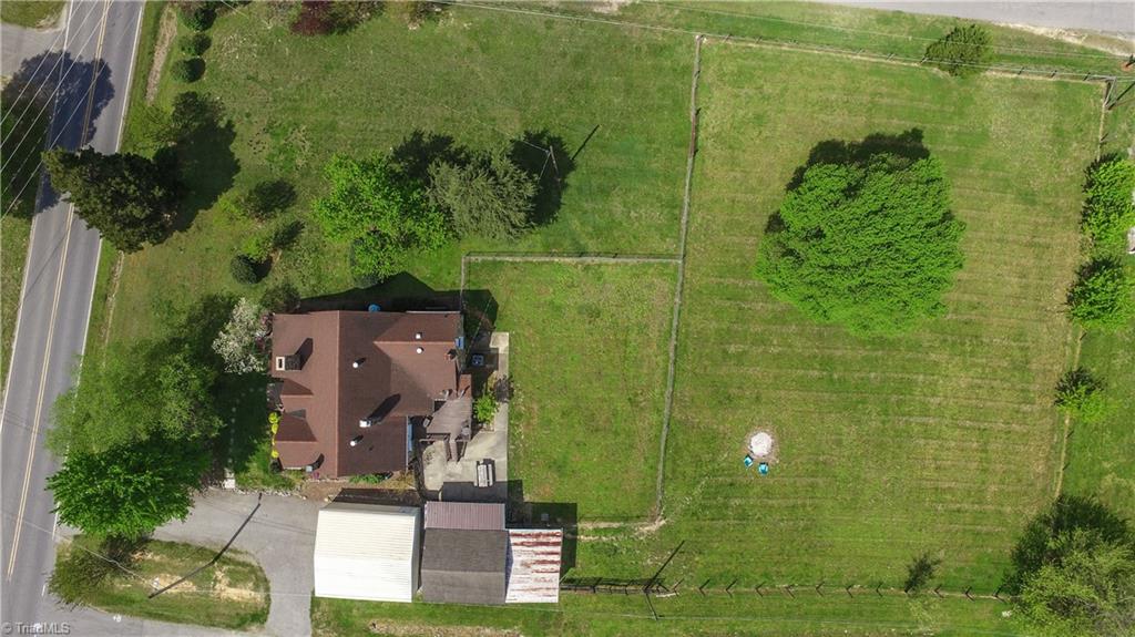 7008 Turnpike Road Archdale, NC 27263 - Photo 3 of 39 Two separate fenced in areas with large shade tree