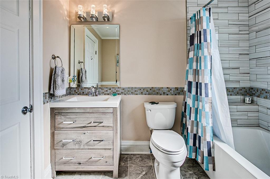 7008 Turnpike Road Archdale, NC 27263 - Photo 23 of 39 2nd bathroom on main floor