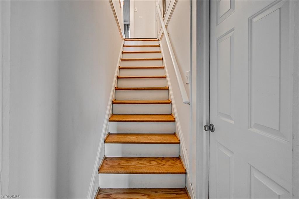 7008 Turnpike Road Archdale, NC 27263 - Photo 25 of 39 Head upstairs to 2 more bedrooms