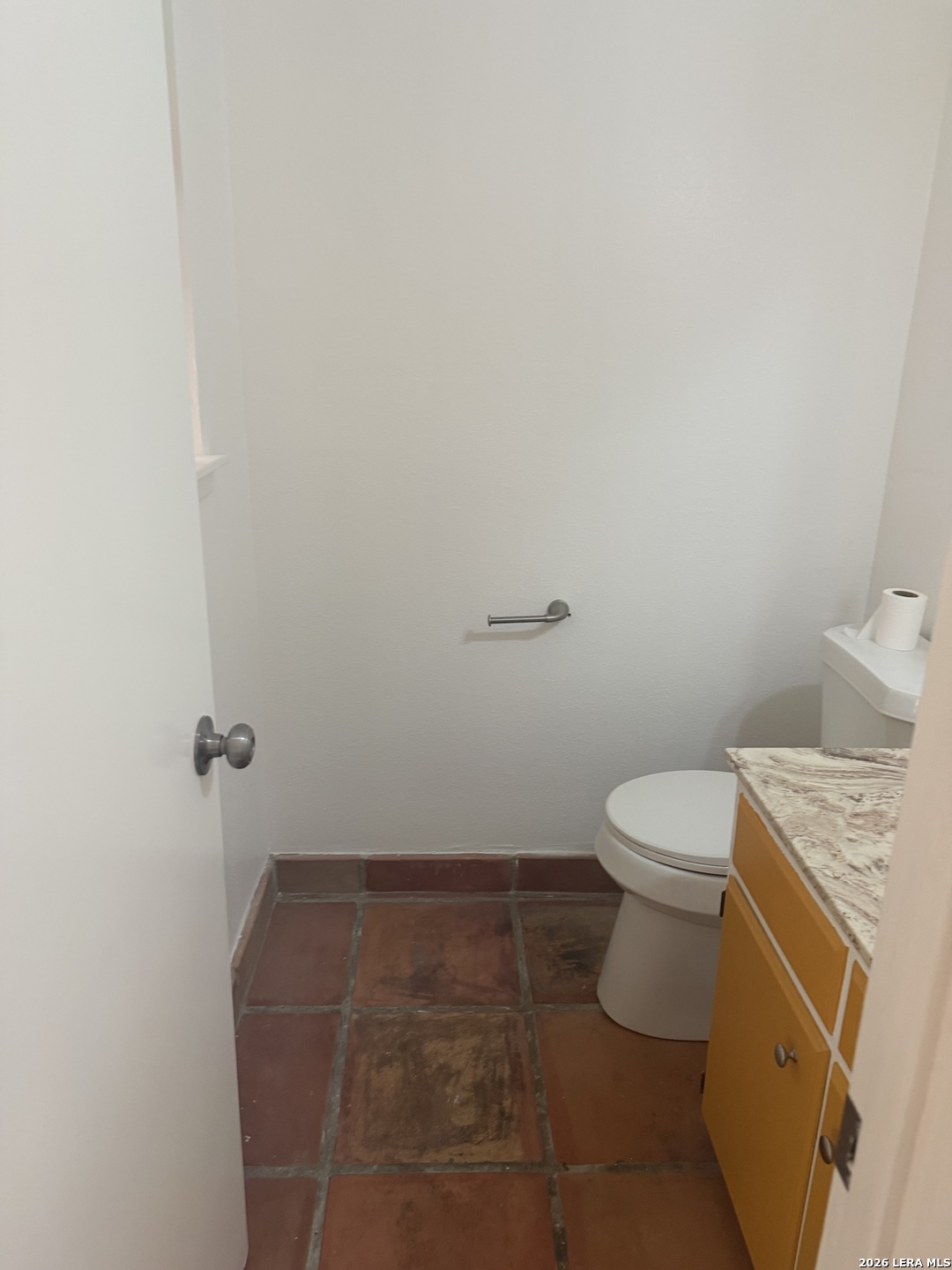 5435 Callaghan Road San Antonio, TX 78228 - Photo 14 of 38 a bathroom with a toilet and a sink