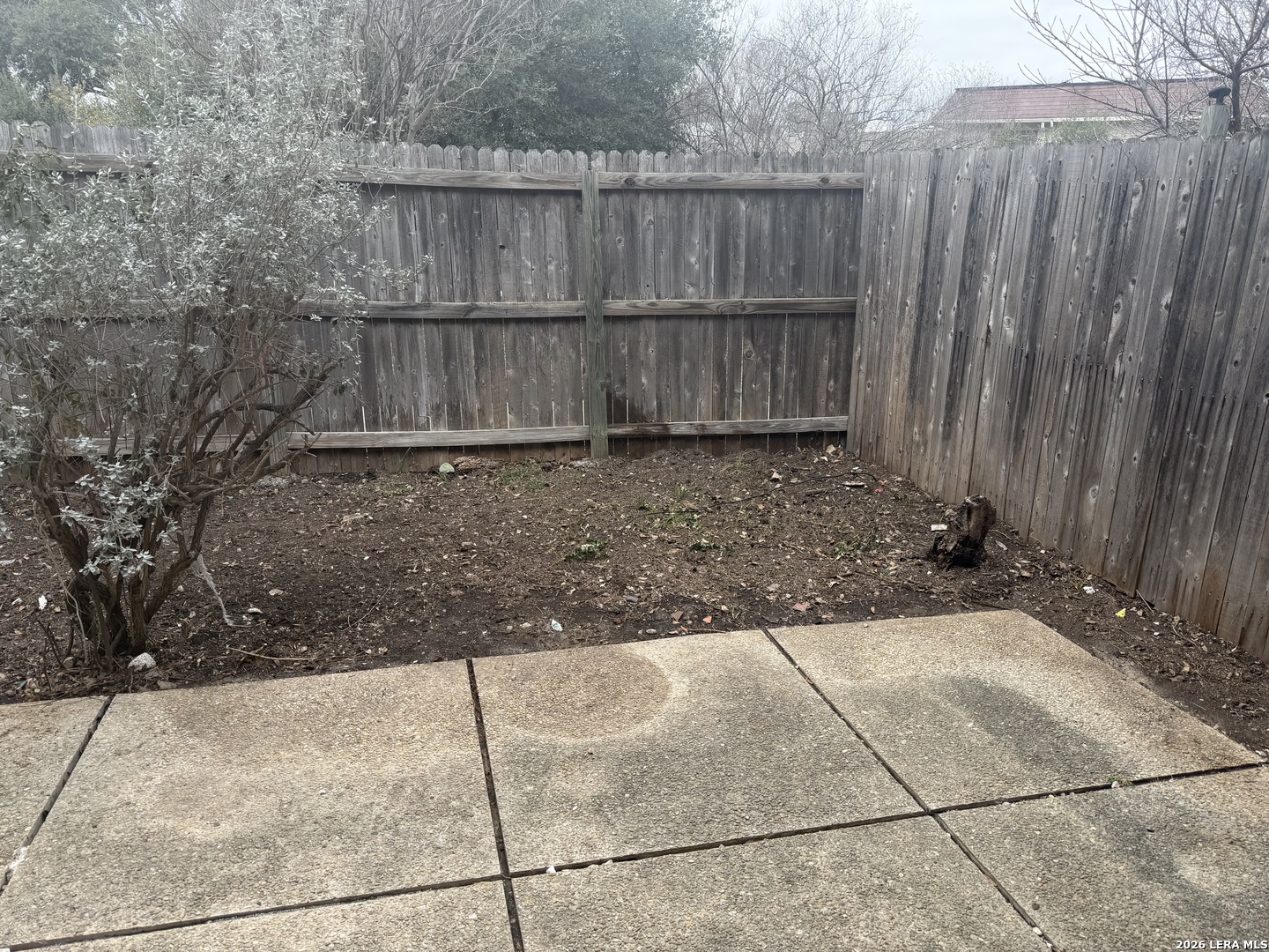 5435 Callaghan Road San Antonio, TX 78228 - Photo 36 of 38 a view of a backyard with wooden fence