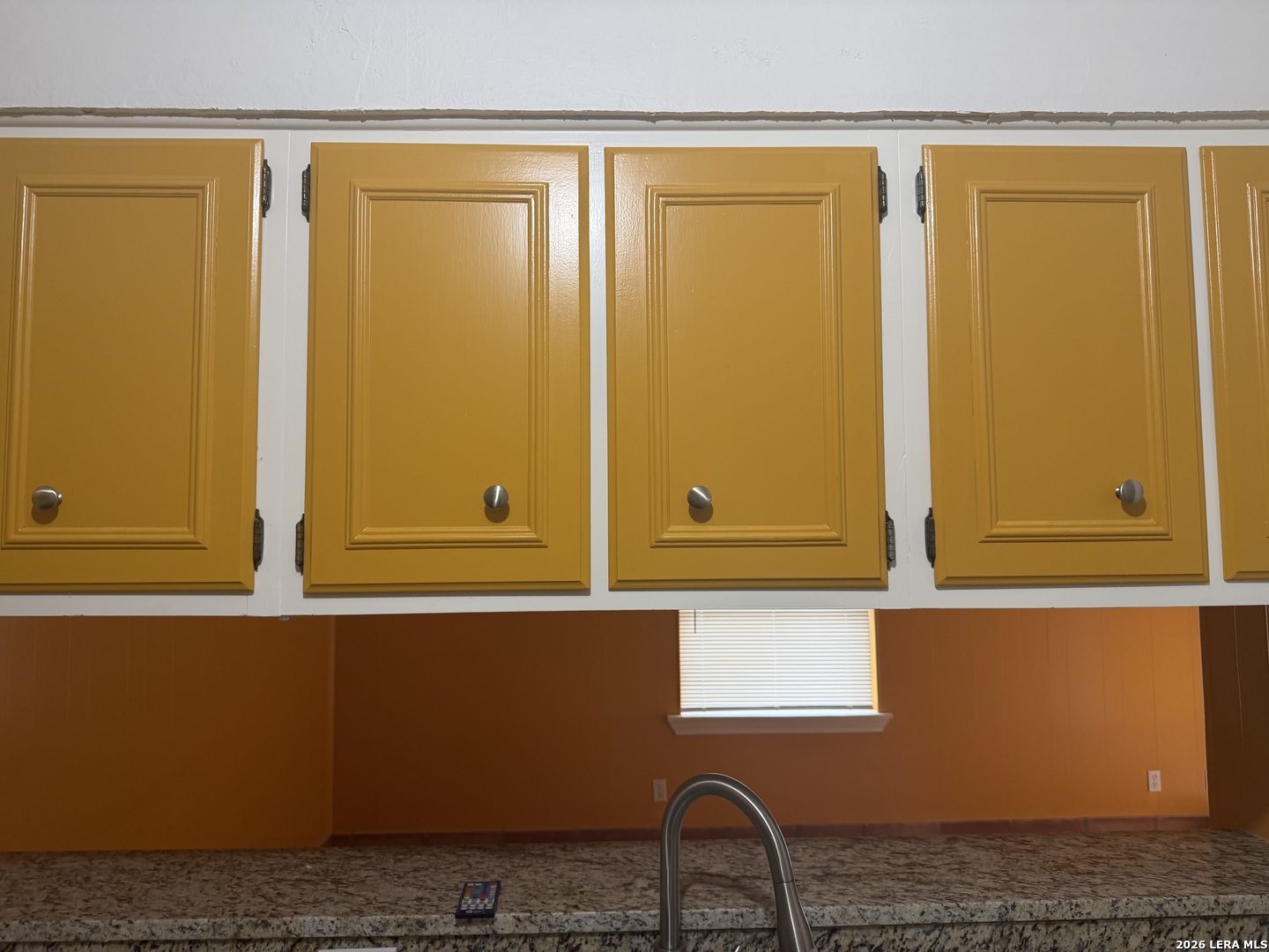 5435 Callaghan Road San Antonio, TX 78228 - Photo 8 of 38 a view of a potted plant sitting in a kitchen