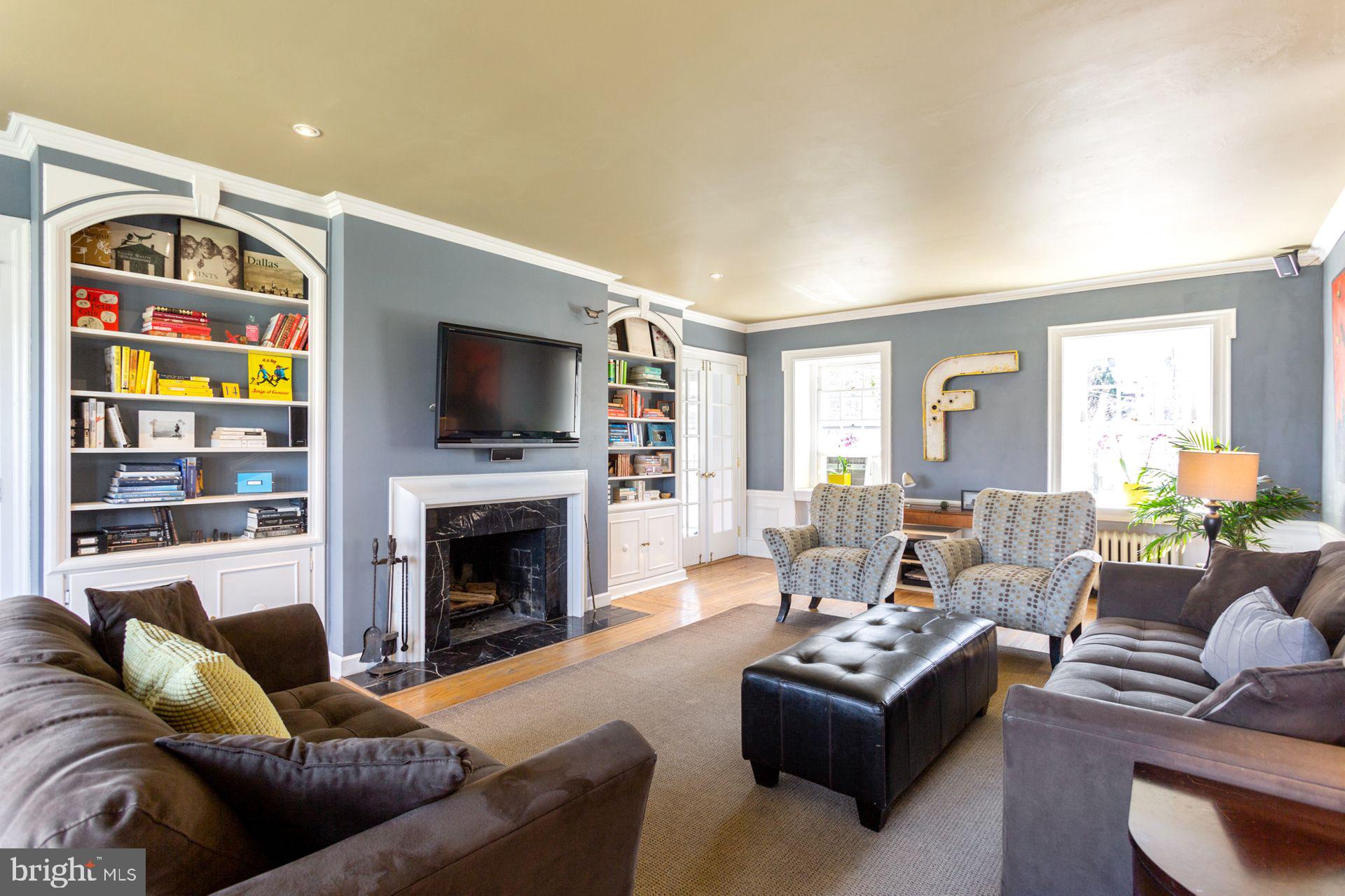 4900 Monument Road Philadelphia, PA 19131 - Photo 4 of 32 Livingroom w/ wood burning fireplace
