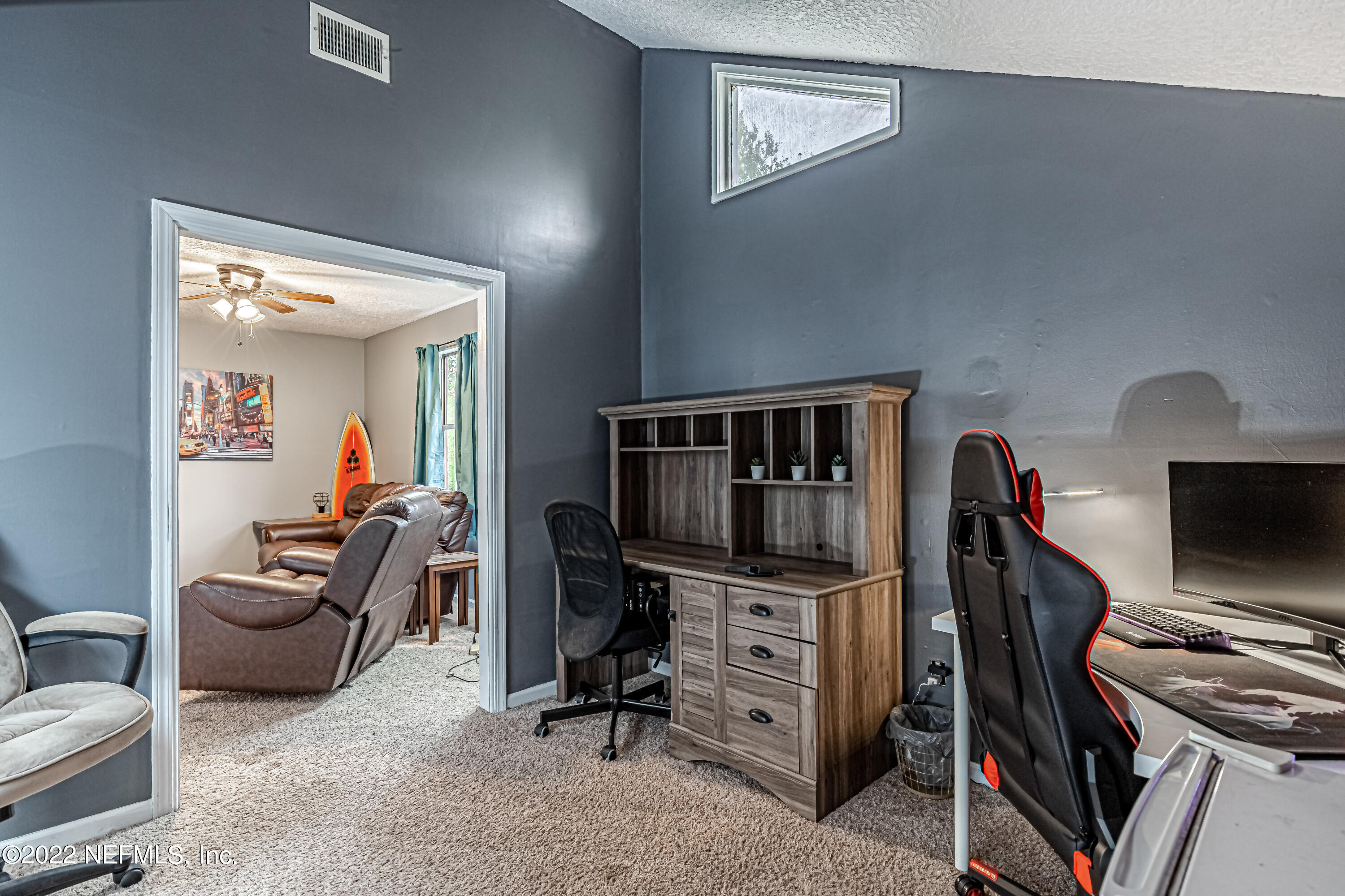 554 George Taylor Street Orange Park, FL 32073 - Photo 22 of 40 a view of a livingroom with furniture and workspace