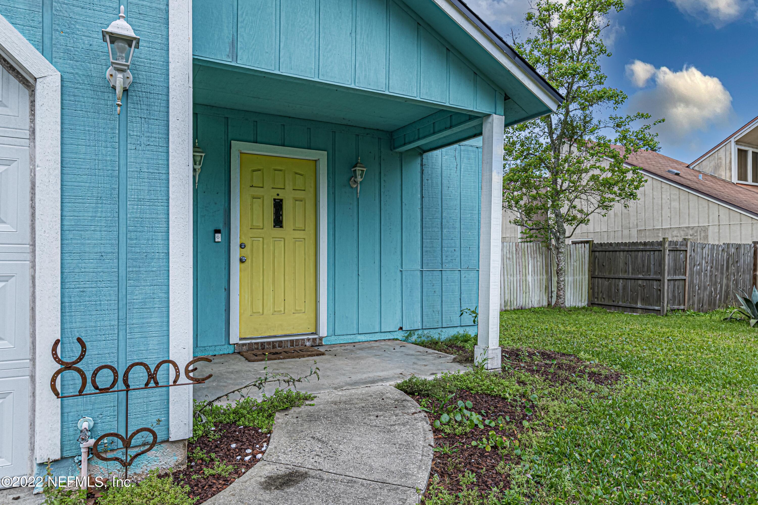 554 George Taylor Street Orange Park, FL 32073 - Photo 4 of 40 a view of a house with a yard