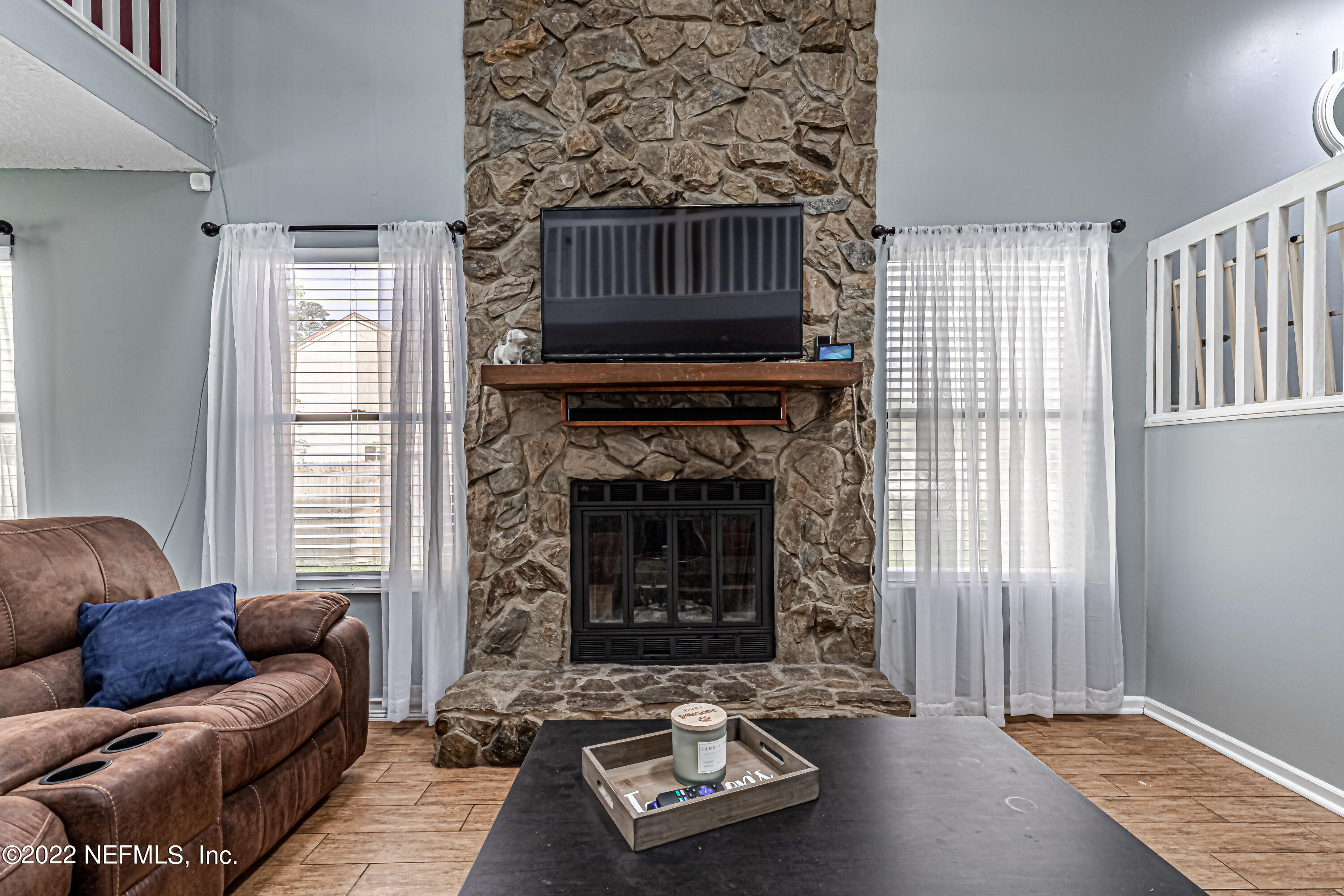 554 George Taylor Street Orange Park, FL 32073 - Photo 10 of 40 a living room with furniture and a fireplace