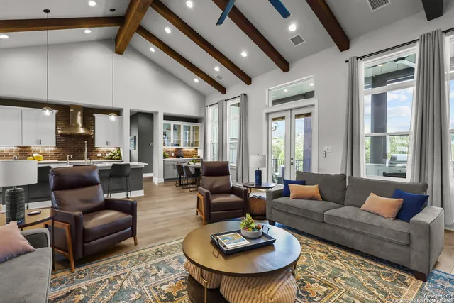 a bedroom with a bed and a television