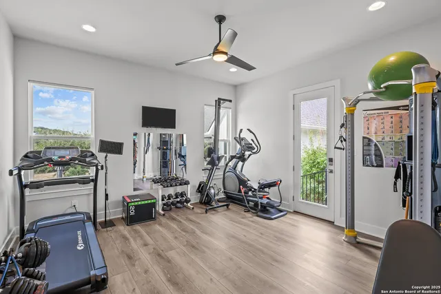 a spacious bathroom with a bathtub and shower