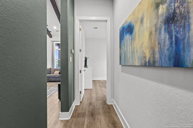 a view of a house with patio and a garden