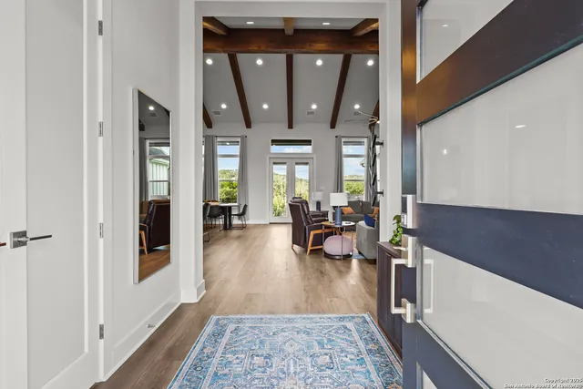 a kitchen with stainless steel appliances and cabinets
