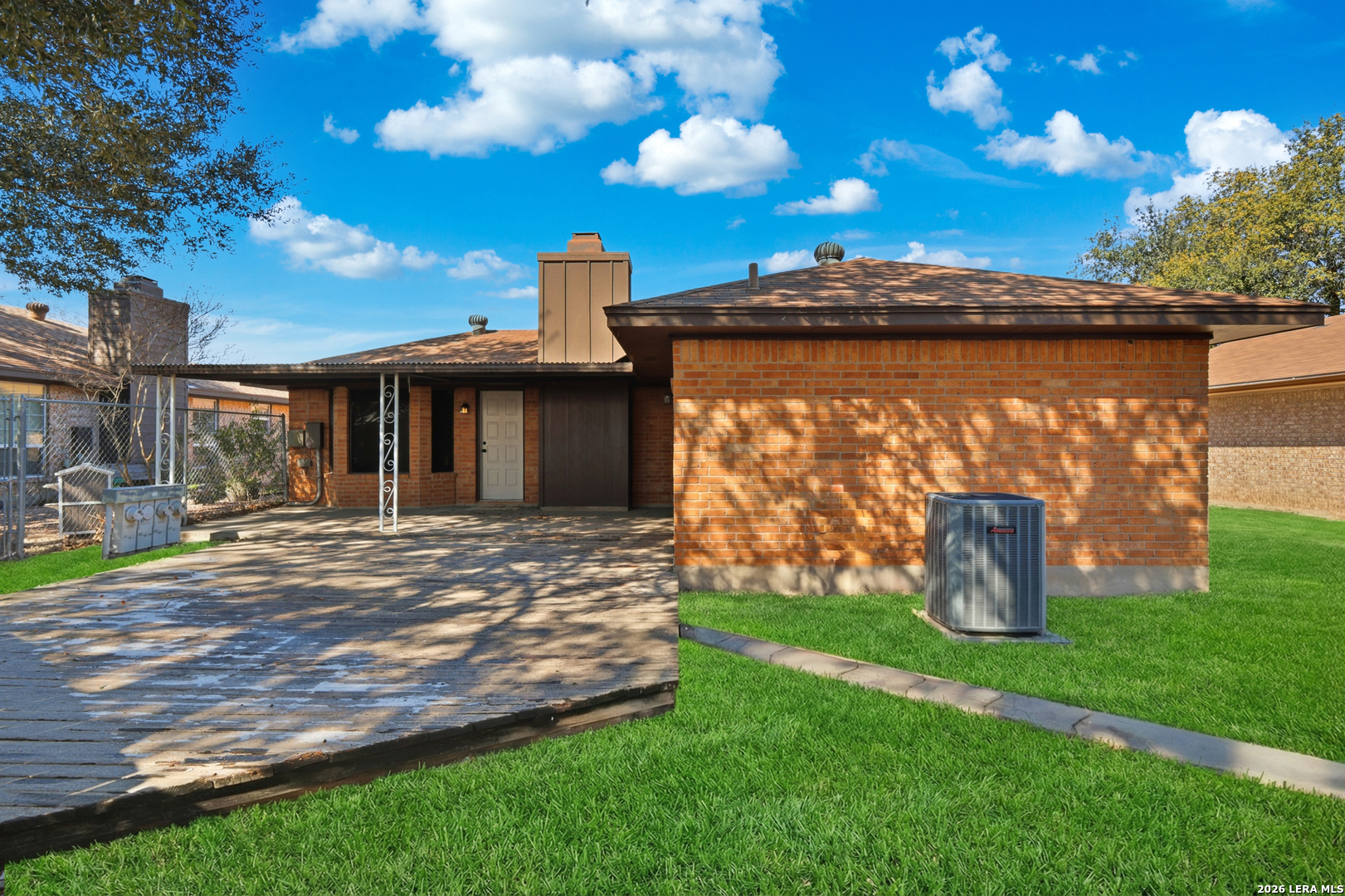 1300 Cyrus Schertz, TX 78154 - Photo 23 of 30 a view of a house with backyard and a garden