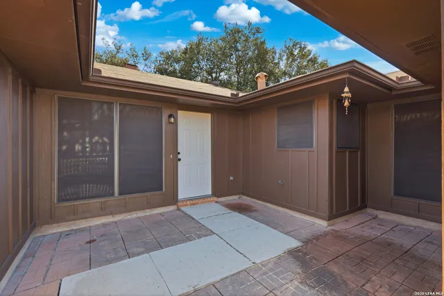 a backyard of a house with lots of green space