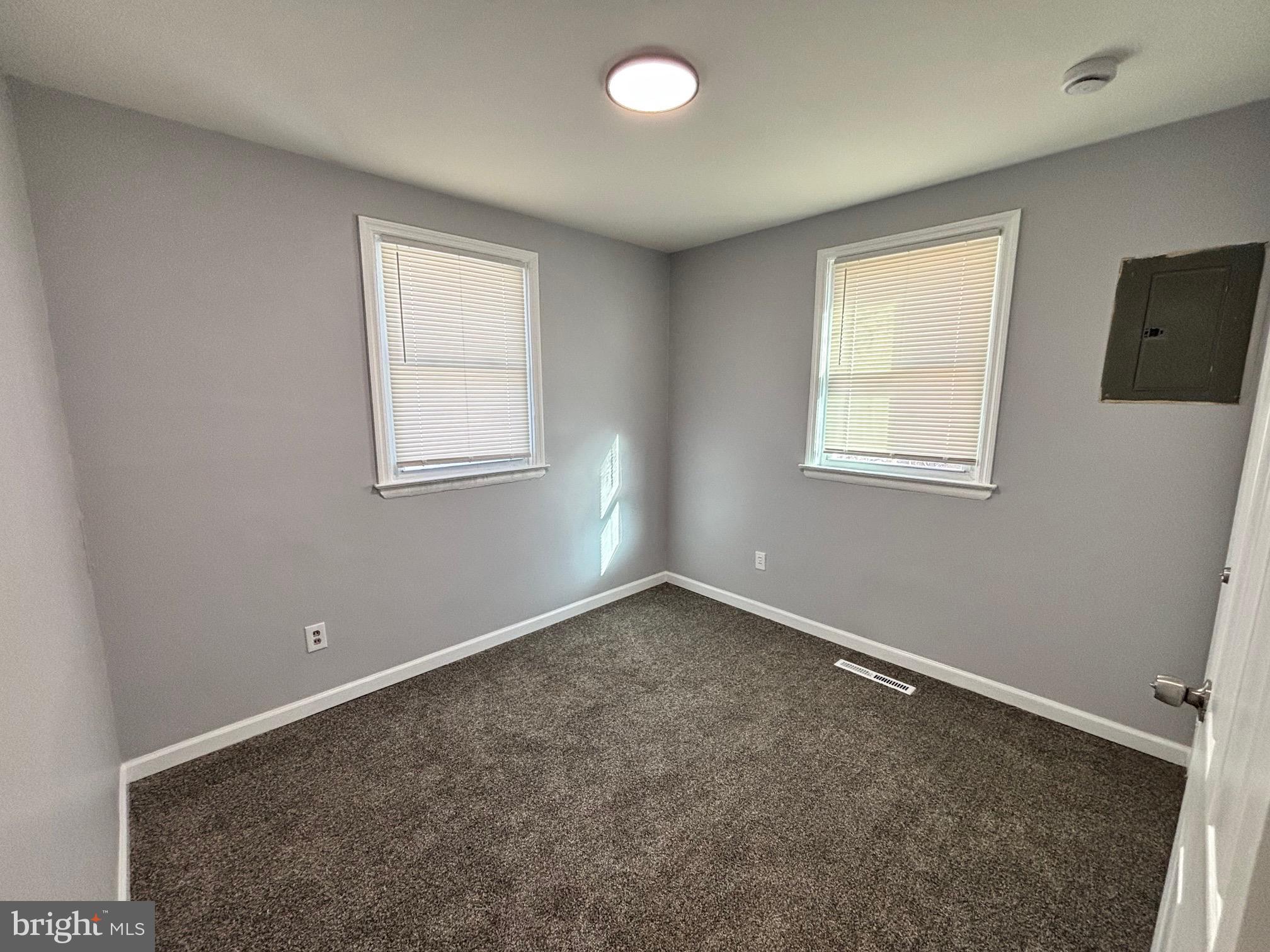 164 Kinsley Road Pemberton, NJ 08068 - Photo 14 of 15 an empty room with windows