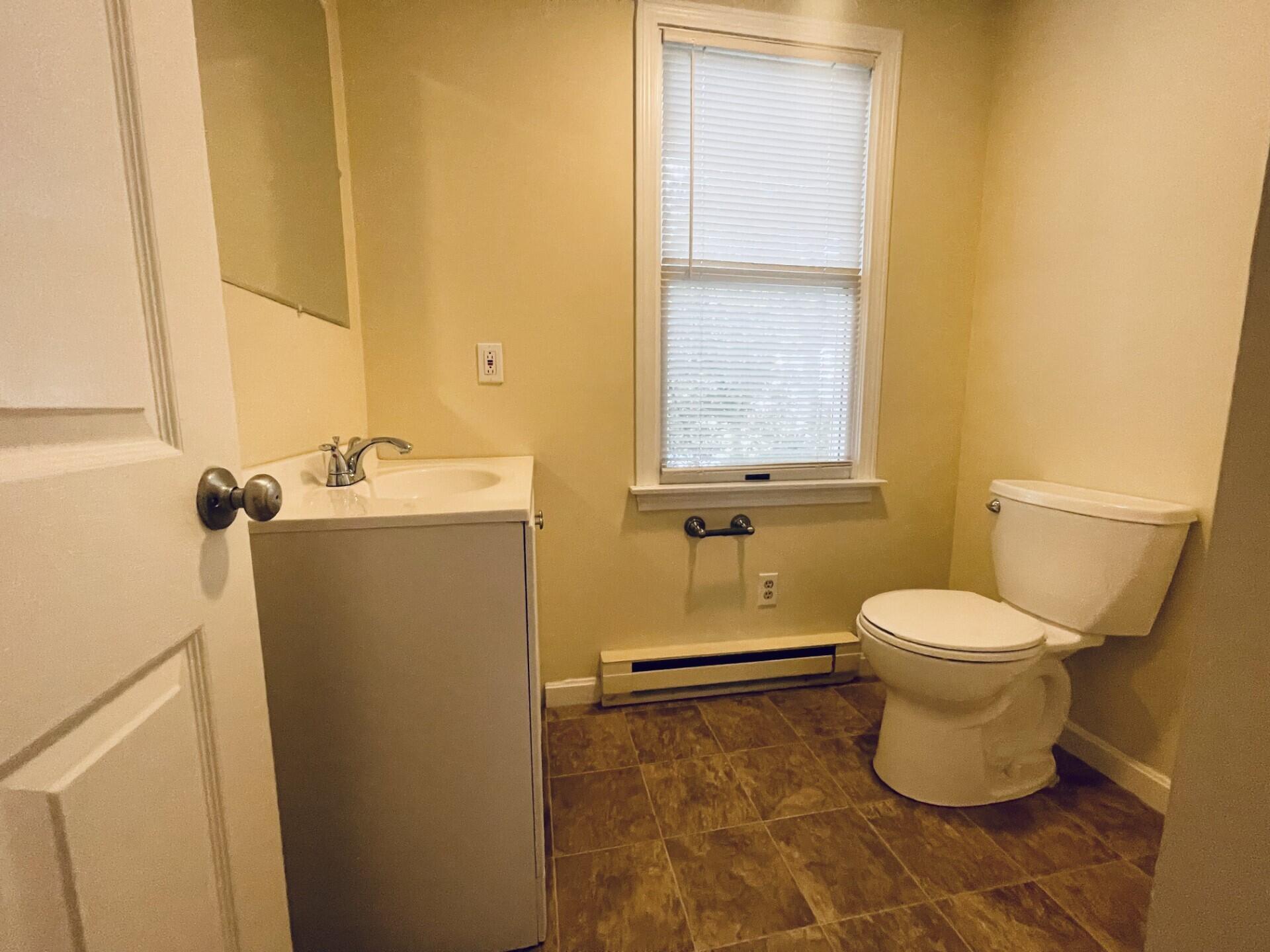 23 Radcliffe Road Mashpee, MA 02649 - Photo 11 of 20 a bathroom with a sink and toilet
