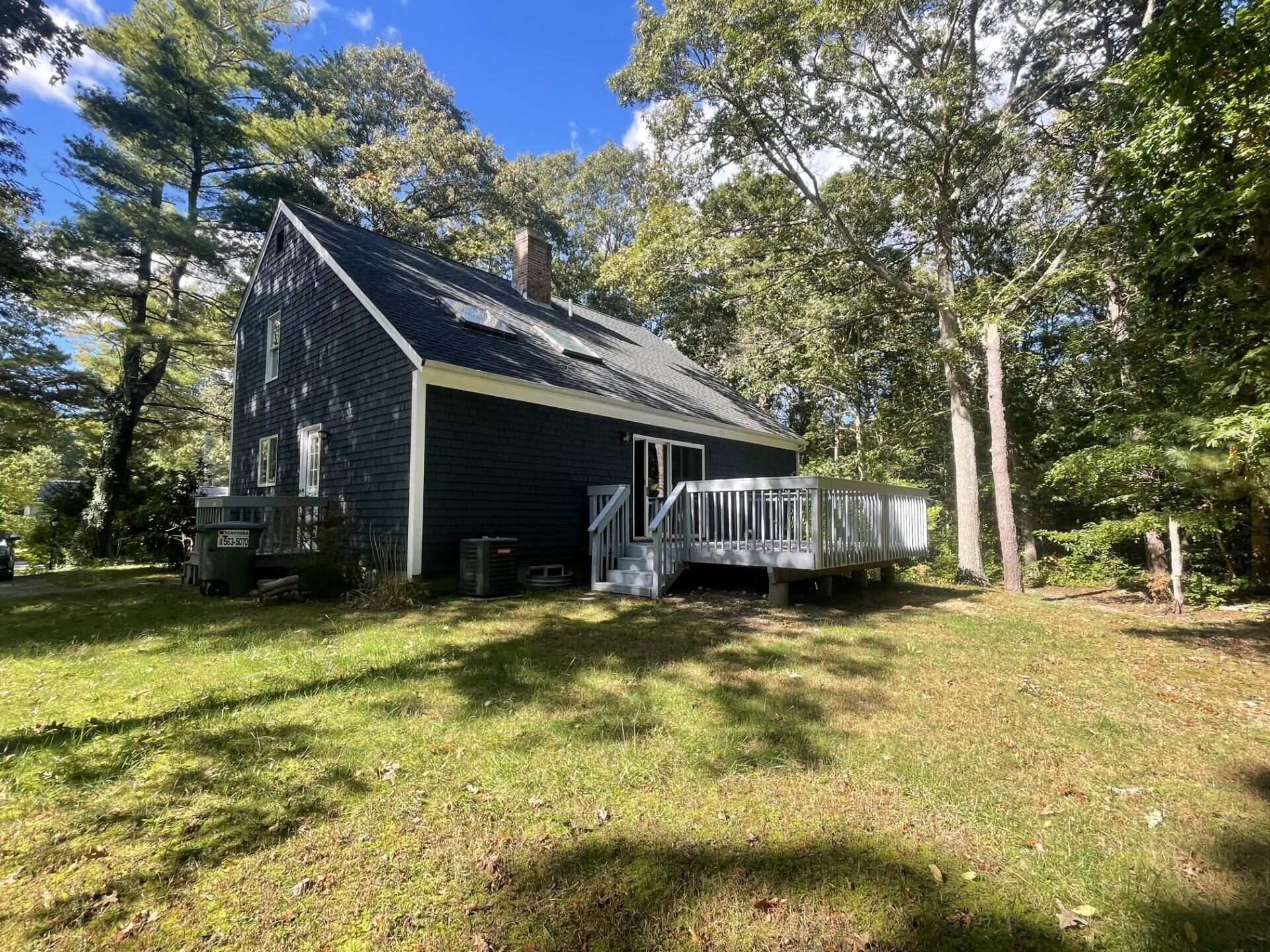 23 Radcliffe Road Mashpee, MA 02649 - Photo 3 of 20 a view of a house with pool and sitting area