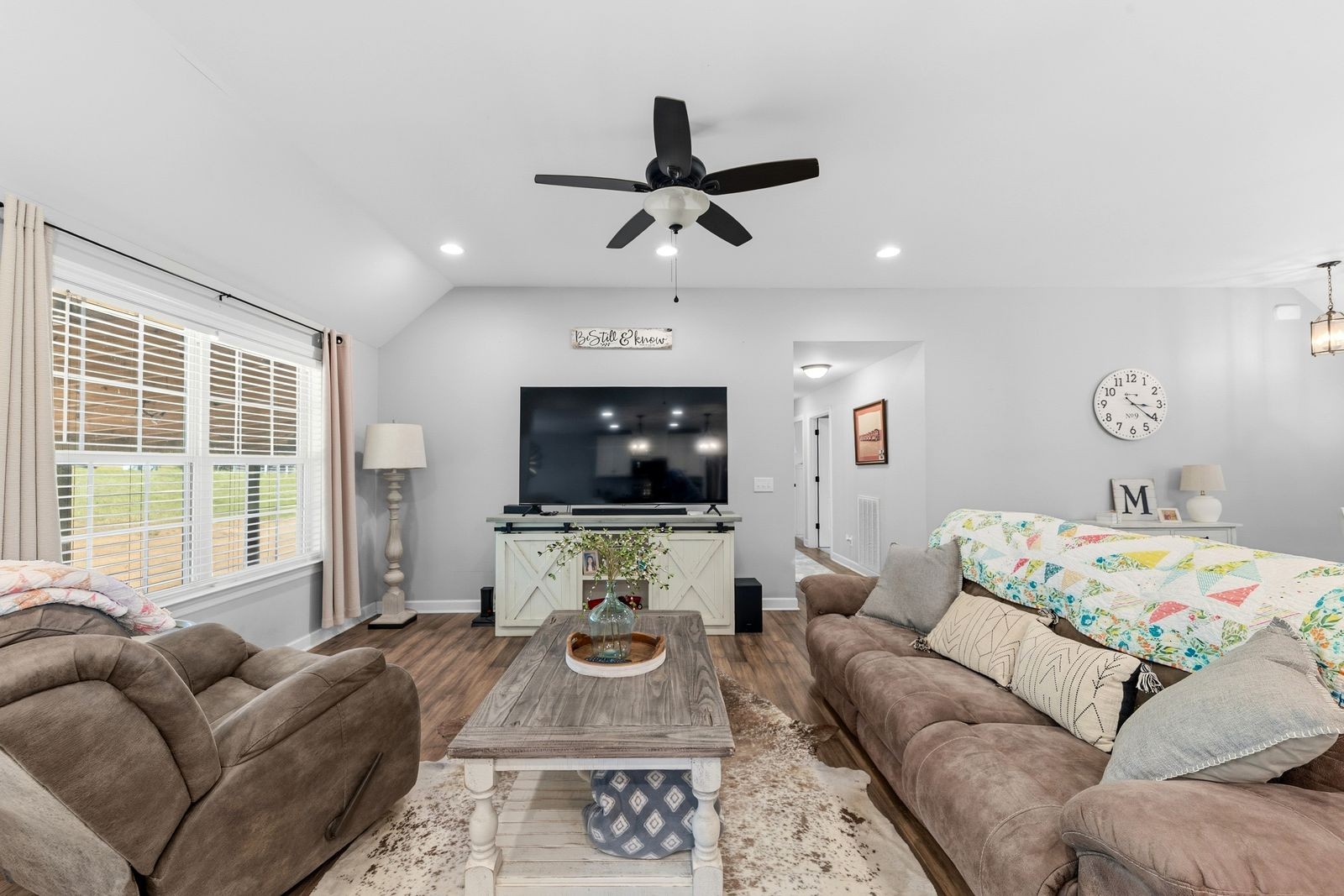 3036 Valley Creek Road Culleoka, TN 38451 - Photo 16 of 56 a living room with furniture and a flat screen tv