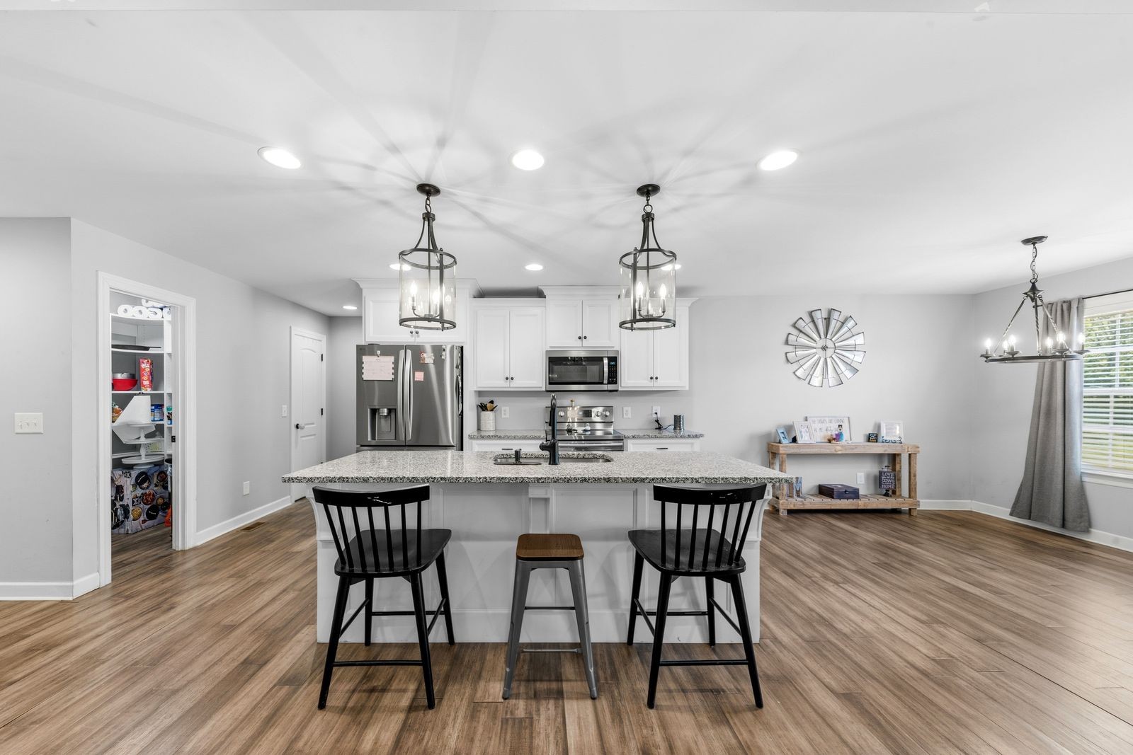 3036 Valley Creek Road Culleoka, TN 38451 - Photo 18 of 56 a view of a dining room with furniture wooden floor and chandelier