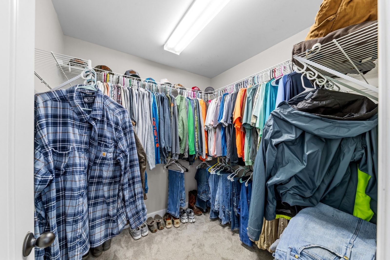3036 Valley Creek Road Culleoka, TN 38451 - Photo 29 of 56 a view of walk in closet with clothes and shoes
