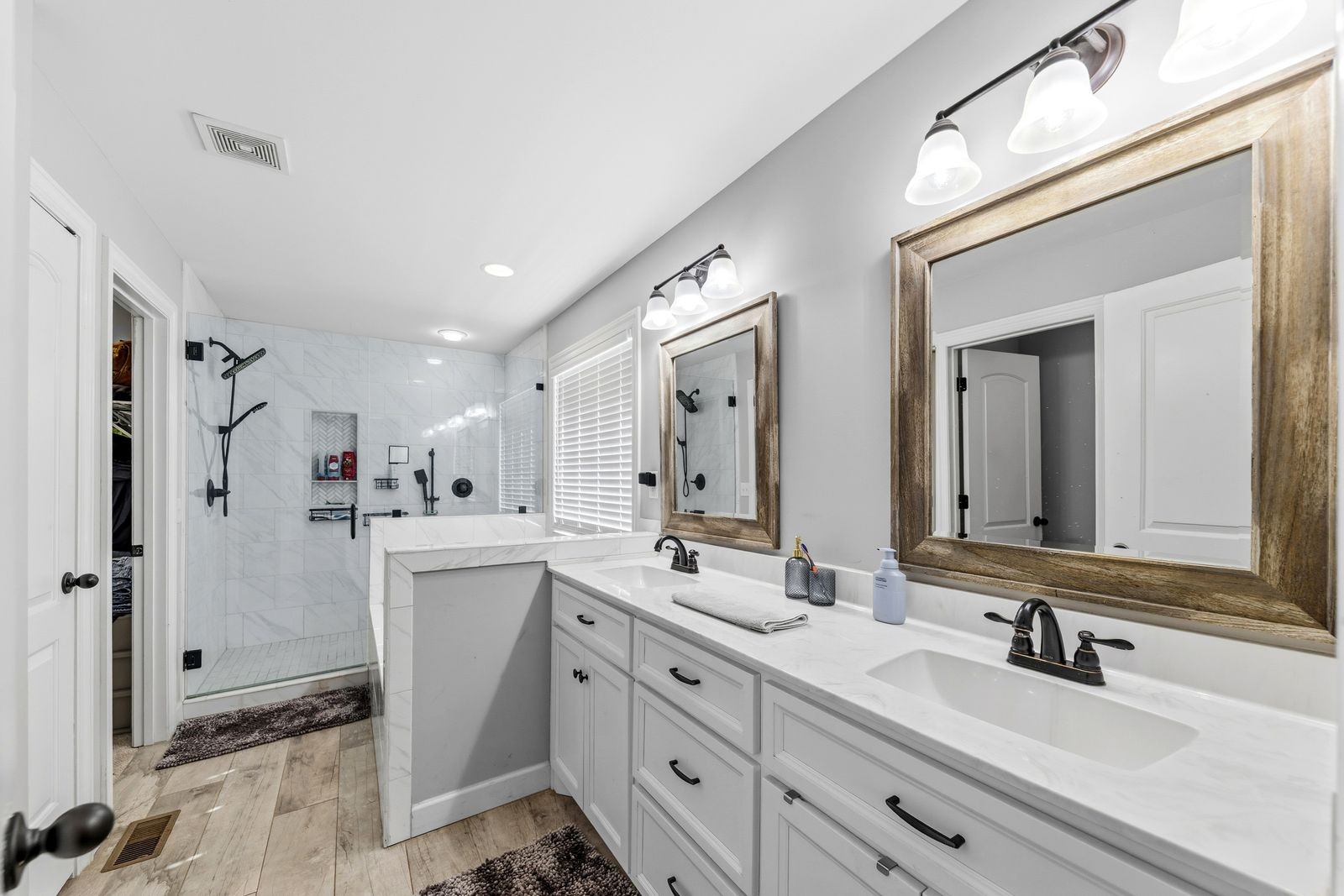 3036 Valley Creek Road Culleoka, TN 38451 - Photo 30 of 56 a bathroom with a double vanity sink mirror and double