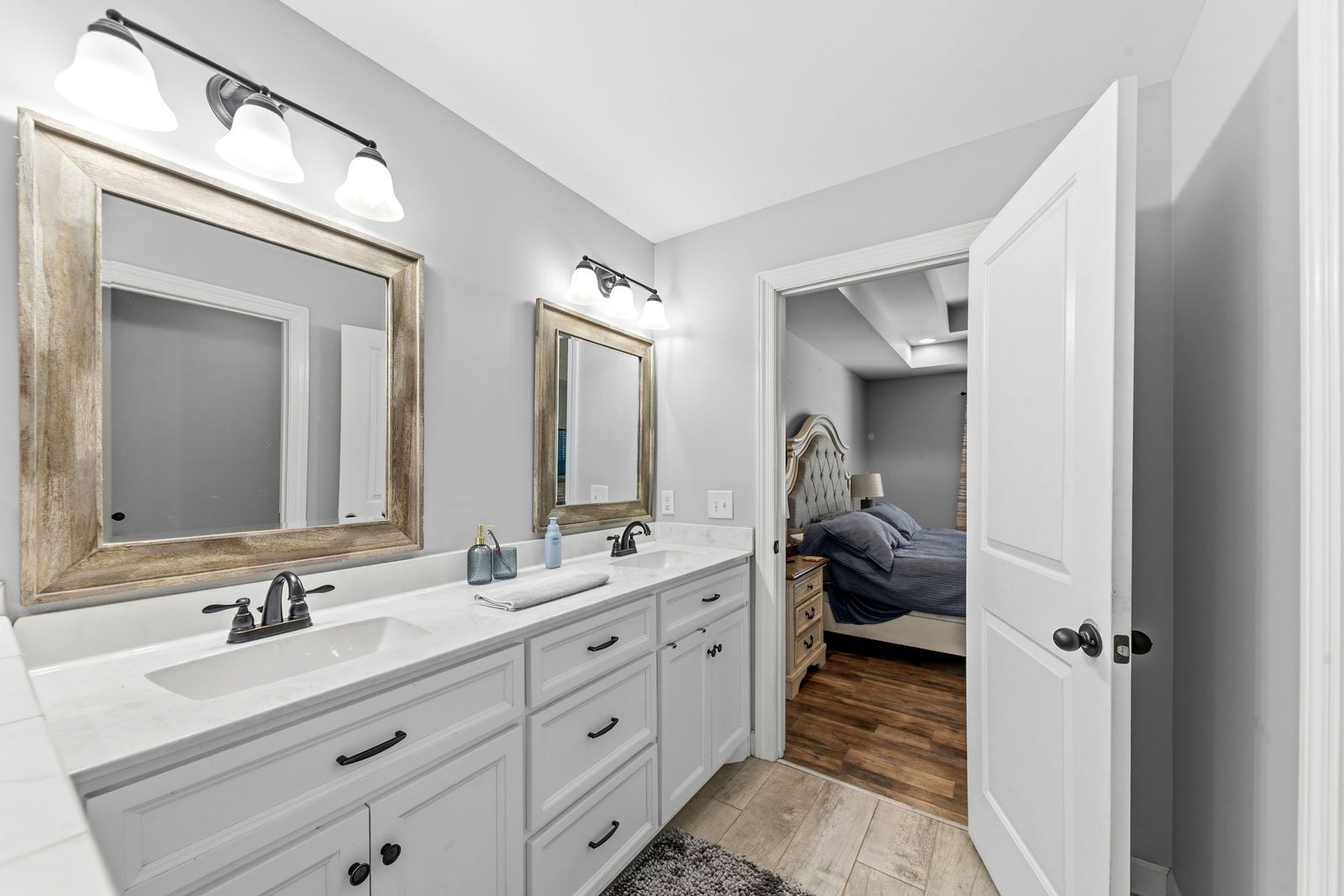 3036 Valley Creek Road Culleoka, TN 38451 - Photo 31 of 56 a en suite bathroom with a double vanity sink and mirror