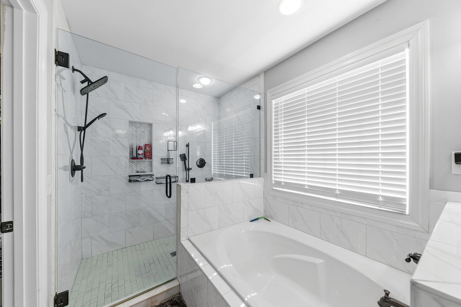 3036 Valley Creek Road Culleoka, TN 38451 - Photo 32 of 56 a bathroom with a tub sink and mirror