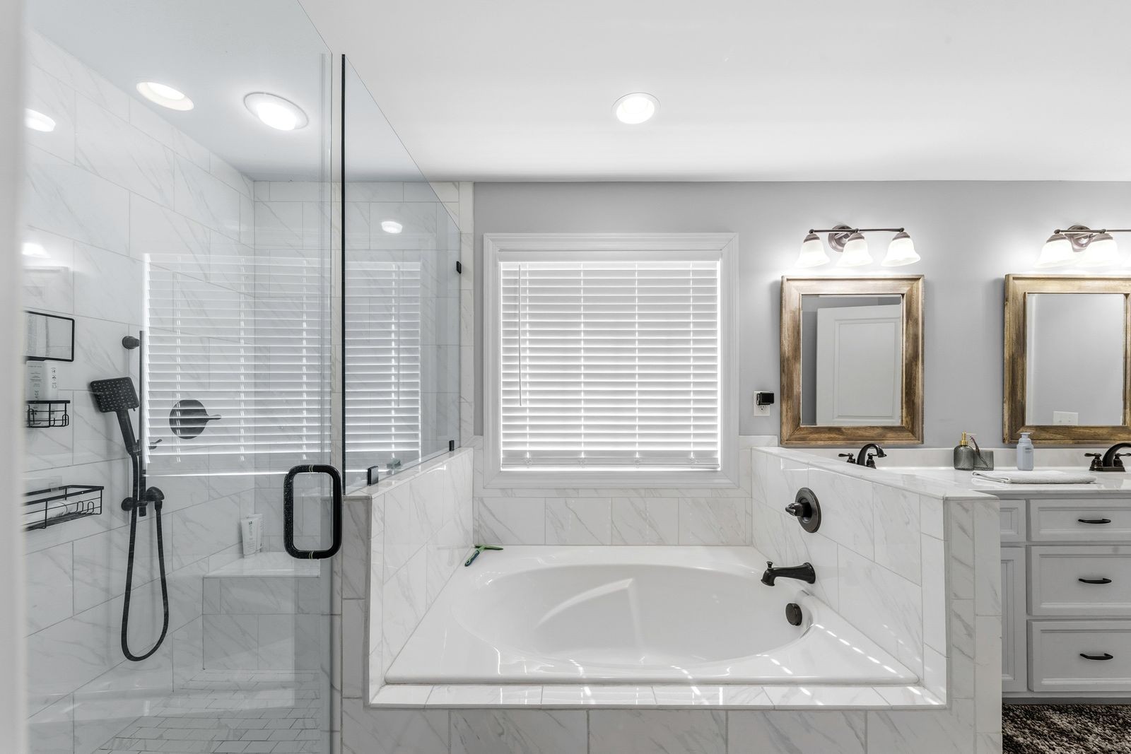 3036 Valley Creek Road Culleoka, TN 38451 - Photo 34 of 56 a bathroom with a tub sink and mirror