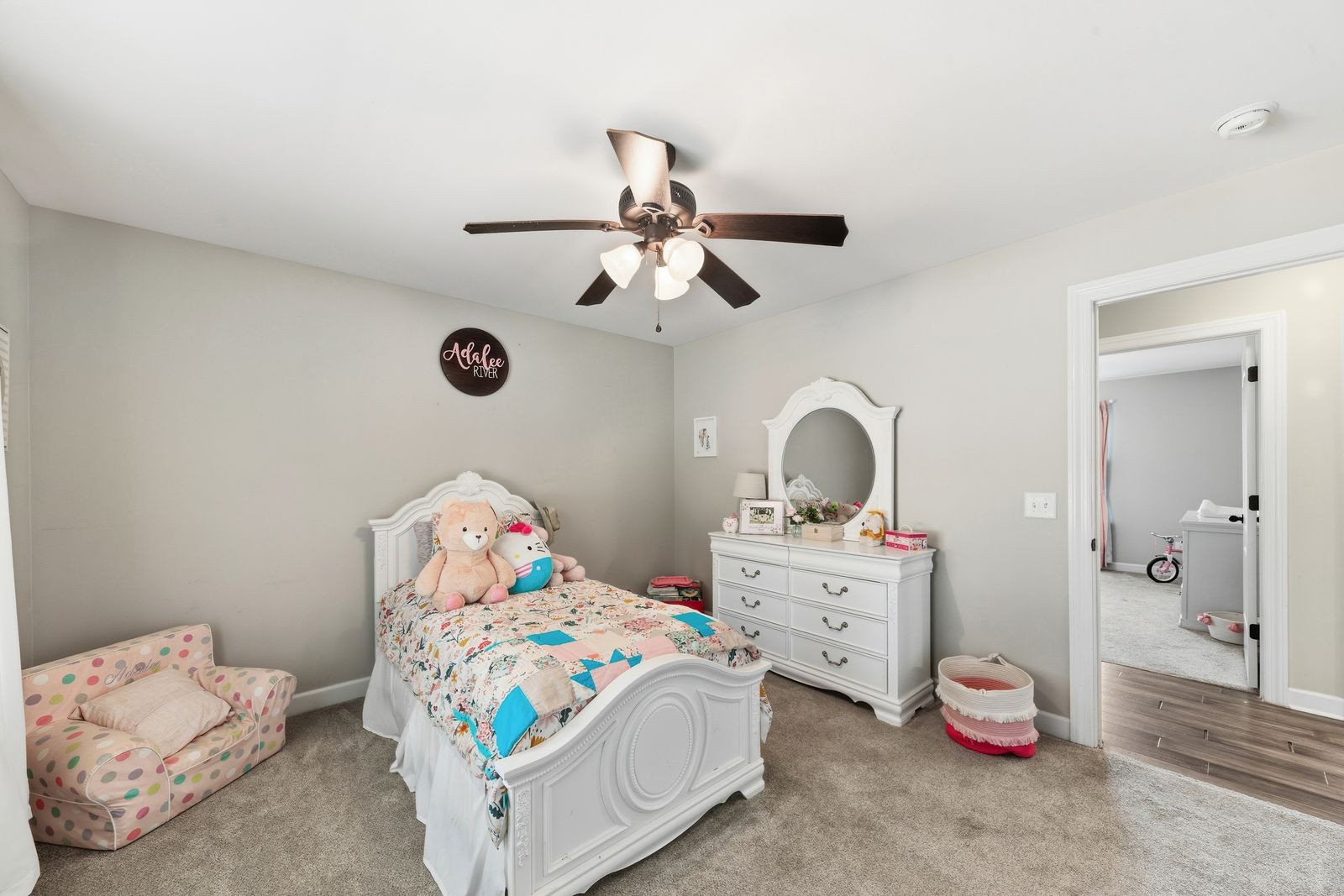 3036 Valley Creek Road Culleoka, TN 38451 - Photo 37 of 56 a bedroom with a bed and a chandelier