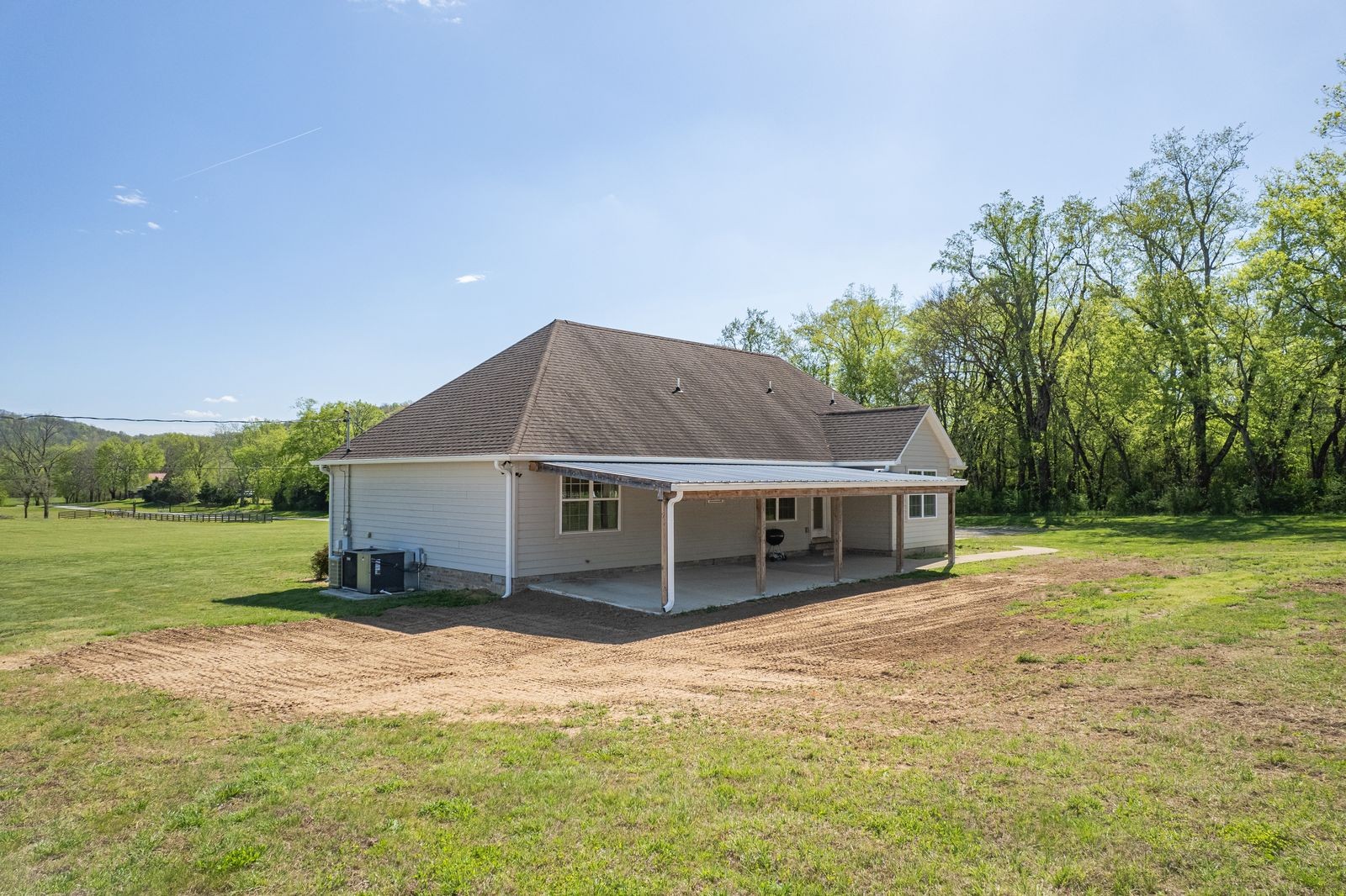 3036 Valley Creek Road Culleoka, TN 38451 - Photo 48 of 56 a house with trees in the background