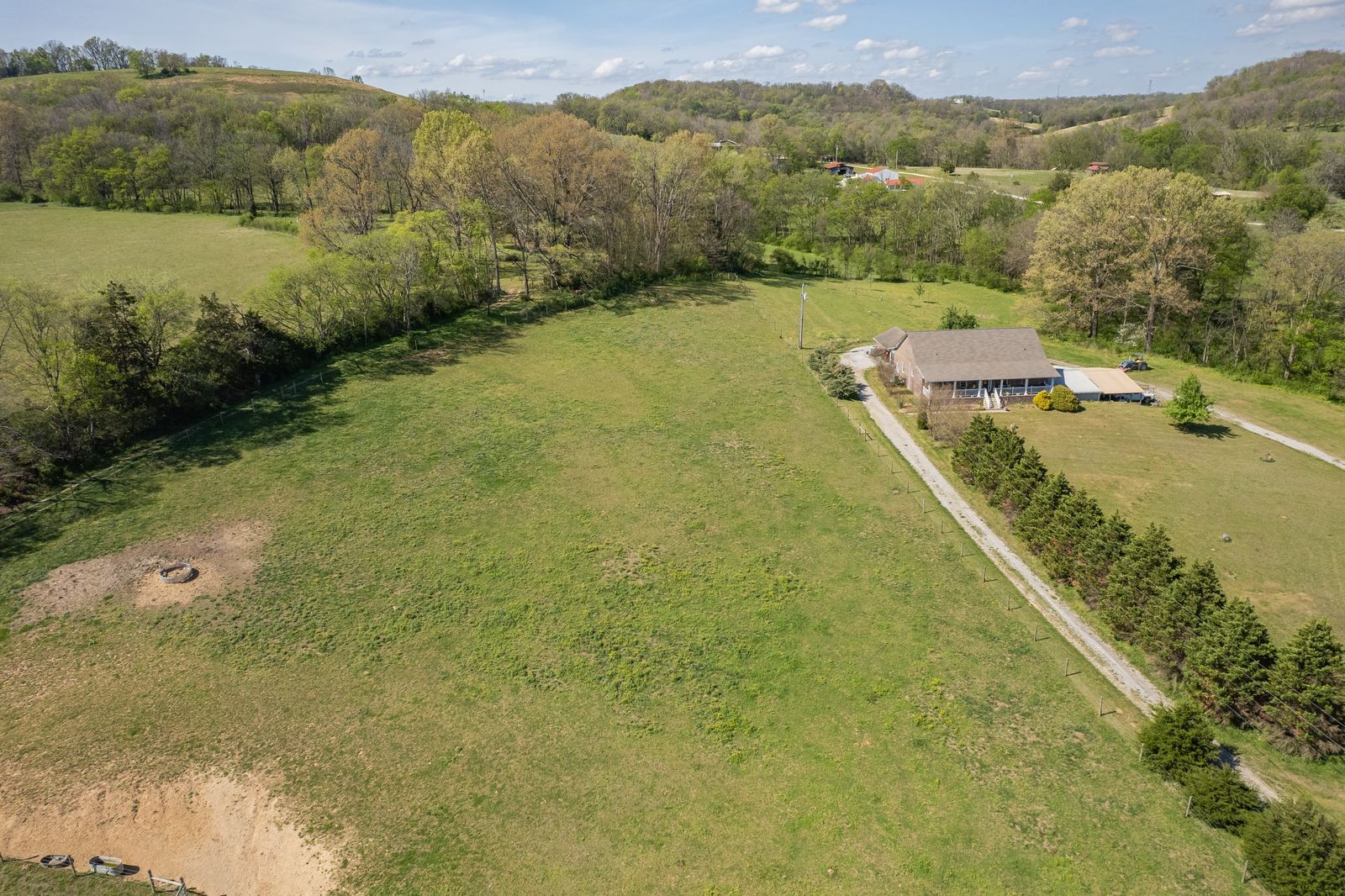 3036 Valley Creek Road Culleoka, TN 38451 - Photo 51 of 56 a view of a lake with a mountain