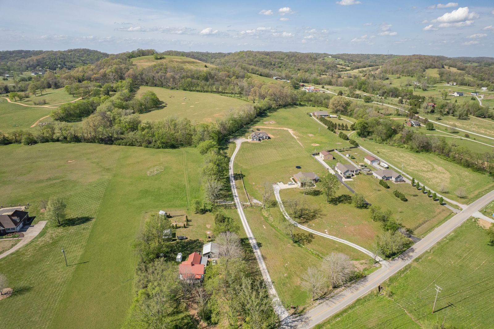 3036 Valley Creek Road Culleoka, TN 38451 - Photo 52 of 56 an aerial view of residential houses with outdoor space