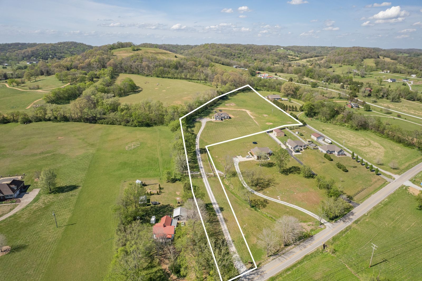 3036 Valley Creek Road Culleoka, TN 38451 - Photo 54 of 56 an aerial view of residential houses with outdoor space