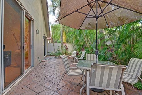 5156 Northwest 26th Circle Boca Raton, FL 33496 - Photo 15 of 18 a view of an outdoor sitting area with furniture