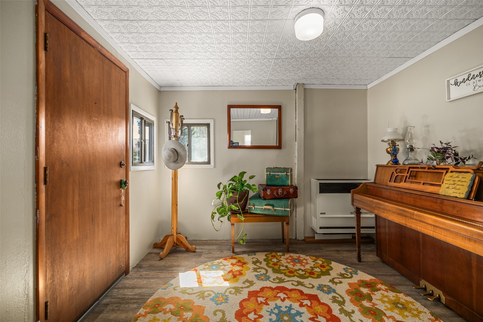 129 South Poplar Street Hayden, CO 81639 - Photo 5 of 26 Wall heater is natural gas and keeps the front of the house warm