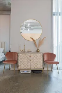 a room with furniture and a chair