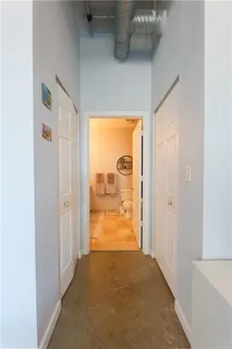 a bathroom with a toilet a sink and a mirror