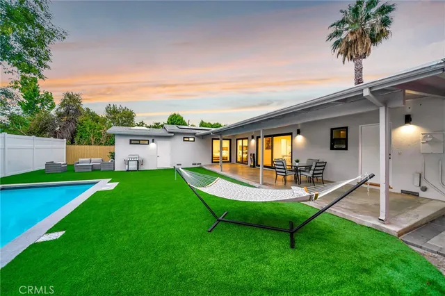 a living room with furniture and a couch