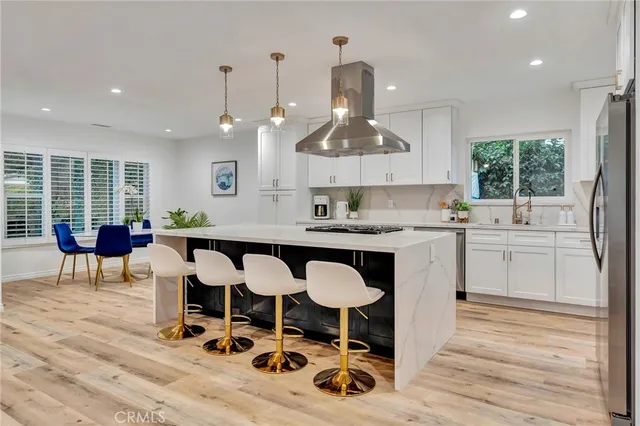 a view of a hallway with washer and dryer