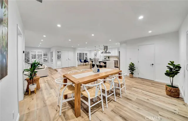 a bedroom with a bed and a desk in it