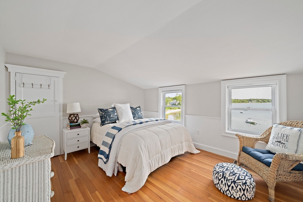 77 Jefferson Shores Road Wareham, MA 02532 - Photo 19 of 34 a spacious bedroom with a bed and a window